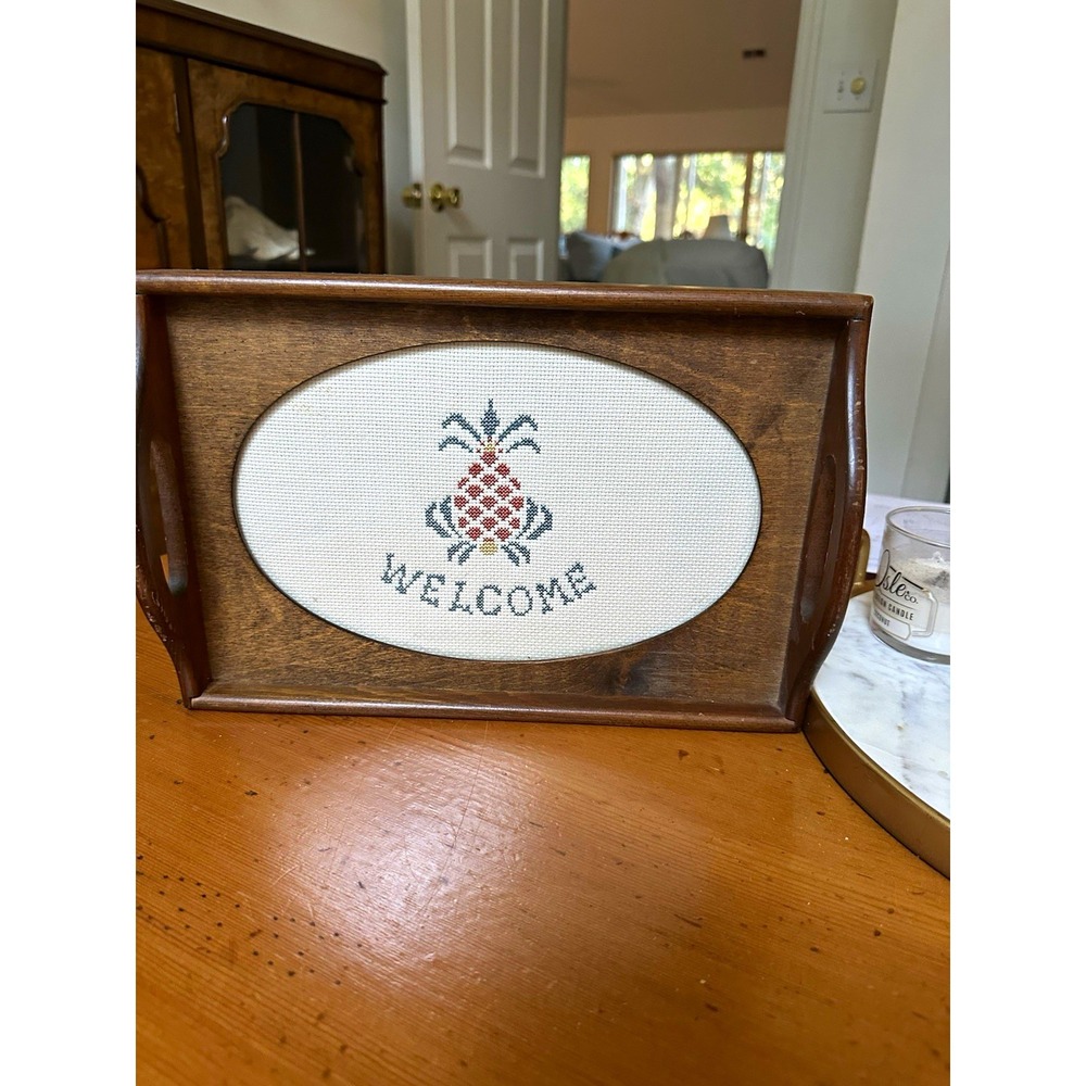 Vintage cross stitch wooden serving tray with a pineapple welcome under glass